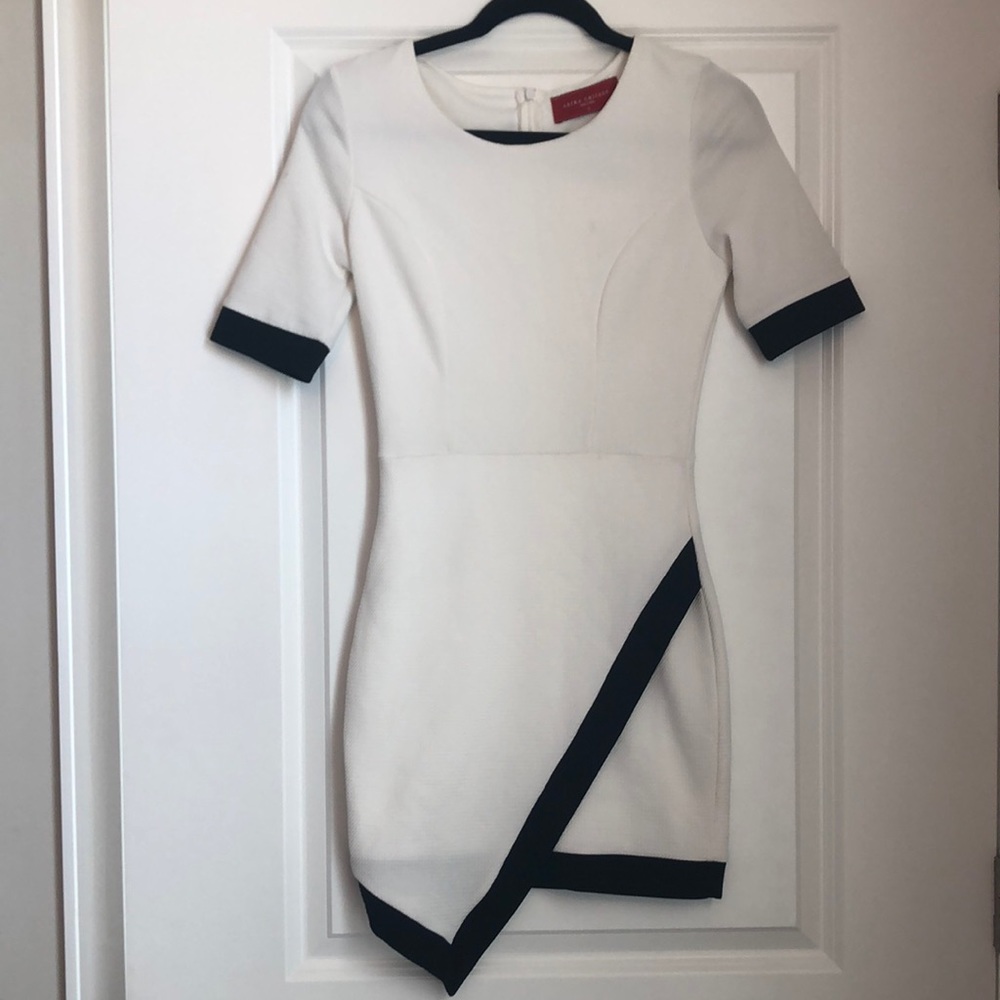 White mini dress with black trim
